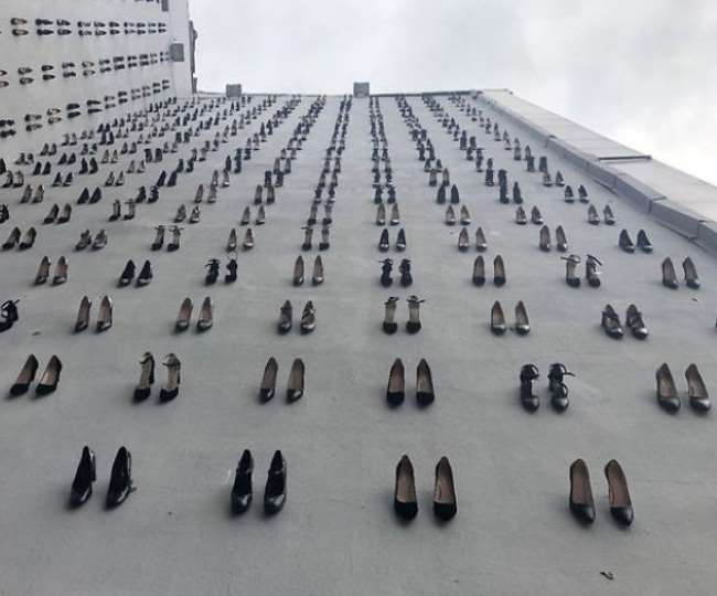 Unique way of protest, 440 pair of shoes hung on the wall of the building